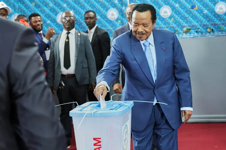 President Paul Biya casts his ballot in Yaounde, Cameroon