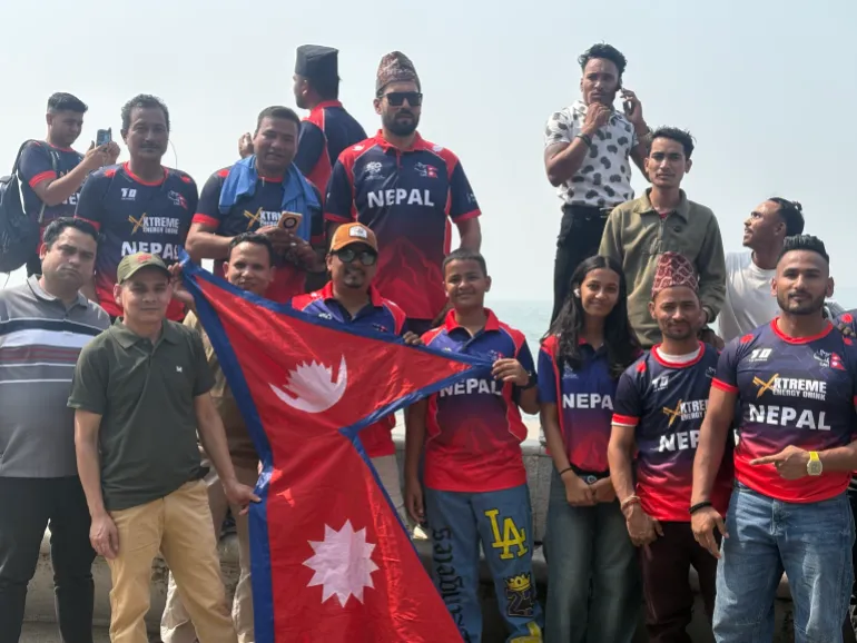 Nepal fans gather outside the Wankhede Stadium around Marine Drive in Mumbai [Manasi Pathak/Al Jazeera]