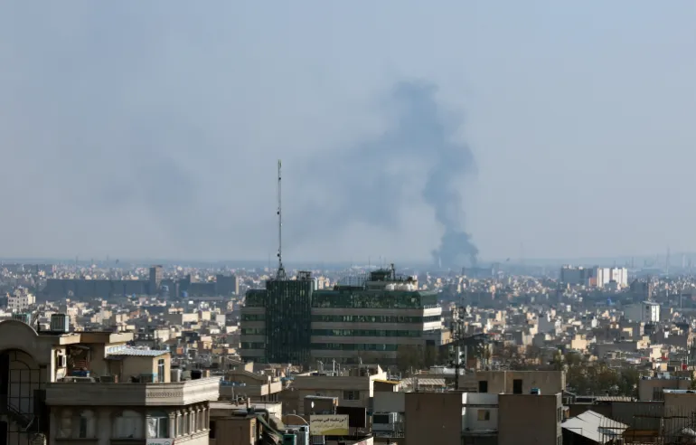 Smoke rises after an airstrike in central Tehran, Iran on April 1, 2026. 