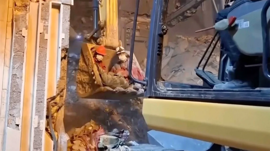 Rescuers search for survivors after strikes hit homes in Iran | US-Israel war on Iran